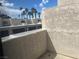 Exterior building view featuring palm trees and blue sky at 2638 Aracatuba Ave, Las Vegas, NV 89121