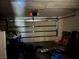 View of the garage interior showing the closed garage door at 2638 Aracatuba Ave, Las Vegas, NV 89121