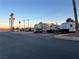 A parking area with several RVs parked at 2638 Aracatuba Ave, Las Vegas, NV 89121
