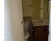 Bathroom with vanity, mirror and toilet at 2663 Aracatuba Ave, Las Vegas, NV 89121