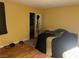 Bright bedroom with wood flooring and a large closet at 2663 Aracatuba Ave, Las Vegas, NV 89121