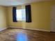 Bedroom with window and hardwood floors at 2663 Aracatuba Ave, Las Vegas, NV 89121