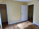 Bedroom with hard surface floors, closet and entry to stairway at 2663 Aracatuba Ave, Las Vegas, NV 89121