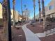 Landscaped community walkway with palm trees at 2663 Aracatuba Ave, Las Vegas, NV 89121