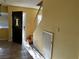 Welcoming entryway featuring a unique front door and staircase at 2663 Aracatuba Ave, Las Vegas, NV 89121