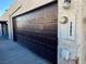 Exterior view of the dark brown garage door at 2663 Aracatuba Ave, Las Vegas, NV 89121