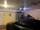 Spacious garage with overhead storage and room for a vehicle at 2663 Aracatuba Ave, Las Vegas, NV 89121
