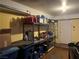 Well-lit garage with shelving and ample storage space at 2663 Aracatuba Ave, Las Vegas, NV 89121