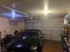 Attached garage with space for car and additional storage at 2663 Aracatuba Ave, Las Vegas, NV 89121