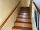 Stairway with wood steps and railings at 2663 Aracatuba Ave, Las Vegas, NV 89121