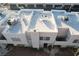 White flat roof tops of townhouses with AC units and parking at 2686 Ruthe Duarte Ave, Las Vegas, NV 89121