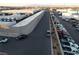 Aerial view of a street with parked cars and a wall at 2686 Ruthe Duarte Ave, Las Vegas, NV 89121