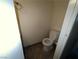 Compact bathroom features a toilet and tiled floor at 2686 Ruthe Duarte Ave, Las Vegas, NV 89121