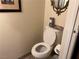 Second bathroom with toilet and open shelving at 2686 Ruthe Duarte Ave, Las Vegas, NV 89121