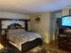 Main bedroom with a large bed and ensuite bathroom at 2686 Ruthe Duarte Ave, Las Vegas, NV 89121