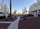 Landscaped community walkway with palm trees and desert landscaping at 2686 Ruthe Duarte Ave, Las Vegas, NV 89121