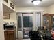 Bright dining area with access to a private patio at 2686 Ruthe Duarte Ave, Las Vegas, NV 89121