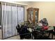 Dining area with round table, chairs, and wooden display cabinet at 2686 Ruthe Duarte Ave, Las Vegas, NV 89121