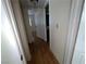 Hallway view with wood floors leading to other rooms in the home at 2686 Ruthe Duarte Ave, Las Vegas, NV 89121