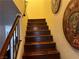 Wooden staircase leading to the upper level at 2686 Ruthe Duarte Ave, Las Vegas, NV 89121