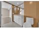 Bathroom with modern vanity and toilet at 322 Karen Ave # 1903, Las Vegas, NV 89109