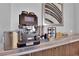 Modern coffee bar with espresso machine and various coffee supplies at 322 Karen Ave # 1903, Las Vegas, NV 89109