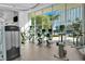 Modern gym with numerous cardio machines and floor-to-ceiling windows at 322 Karen Ave # 1903, Las Vegas, NV 89109
