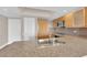 Granite kitchen island with double sink and modern fixtures at 322 Karen Ave # 1903, Las Vegas, NV 89109