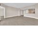 Open living room with hardwood floors and kitchen access at 322 Karen Ave # 1903, Las Vegas, NV 89109