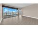 Living room with floor-to-ceiling windows and city views at 322 Karen Ave # 1903, Las Vegas, NV 89109