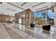 Elegant building lobby with seating and large windows at 322 Karen Ave # 1903, Las Vegas, NV 89109