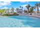 Inviting swimming pool with a cabana and lush landscaping at 322 Karen Ave # 1903, Las Vegas, NV 89109