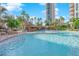 Inviting swimming pool with a rock waterfall feature at 322 Karen Ave # 1903, Las Vegas, NV 89109