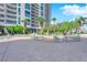 Spacious pool deck with lounge chairs and a sandy area near the building at 322 Karen Ave # 1903, Las Vegas, NV 89109