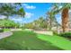 Landscaped putting green with lush artificial turf at 322 Karen Ave # 1903, Las Vegas, NV 89109