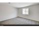 Simple bedroom with neutral wall paint and carpet flooring at 340 Talladega Ct # Lot 13, Henderson, NV 89015
