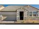 Single-story home with a neutral color scheme and stone accents at 340 Talladega Ct # Lot 13, Henderson, NV 89015