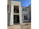 Modern two-story townhome with a private balcony and walkway at 353 Ukelele Pl # Lot 149, Henderson, NV 89015