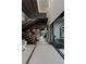 Grand entry with modern staircase and courtyard views at 3530 Cosima Ln, Las Vegas, NV 89120