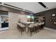 Modern home bar with seating and stone accents at 3530 Cosima Ln, Las Vegas, NV 89120