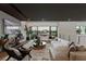 Open living area with large sectional sofa and views at 3530 Cosima Ln, Las Vegas, NV 89120