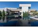 Luxury backyard with a large, modern pool and patio at 3530 Cosima Ln, Las Vegas, NV 89120
