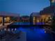 Expansive pool and patio at night with modern design at 3530 Cosima Ln, Las Vegas, NV 89120
