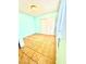 Bedroom featuring pale teal walls, tile floors, and closet with sliding doors at 3620 Park Oliver Dr, Las Vegas, NV 89110
