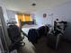 Main bedroom with double bed and an armchair at 3620 Park Oliver Dr, Las Vegas, NV 89110