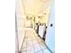 Hallway laundry area with tile flooring and a washer/dryer at 3620 Park Oliver Dr, Las Vegas, NV 89110