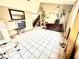 Living room features tile flooring, lots of space, and a staircase to upper level at 3620 Park Oliver Dr, Las Vegas, NV 89110
