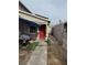 View of the home's side, showing a walkway and fence at 3620 Park Oliver Dr, Las Vegas, NV 89110