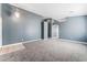 Spacious living room with gray walls and carpeted floor at 3902 Winter Whitetail St, Las Vegas, NV 89122