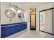 Updated bathroom with double vanity, patterned tile, and a bathtub at 3954 Edgemoor Way, Las Vegas, NV 89121